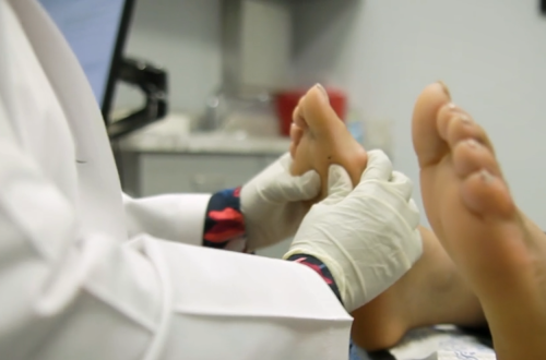 Dr Curry Inspecting Feet Pic